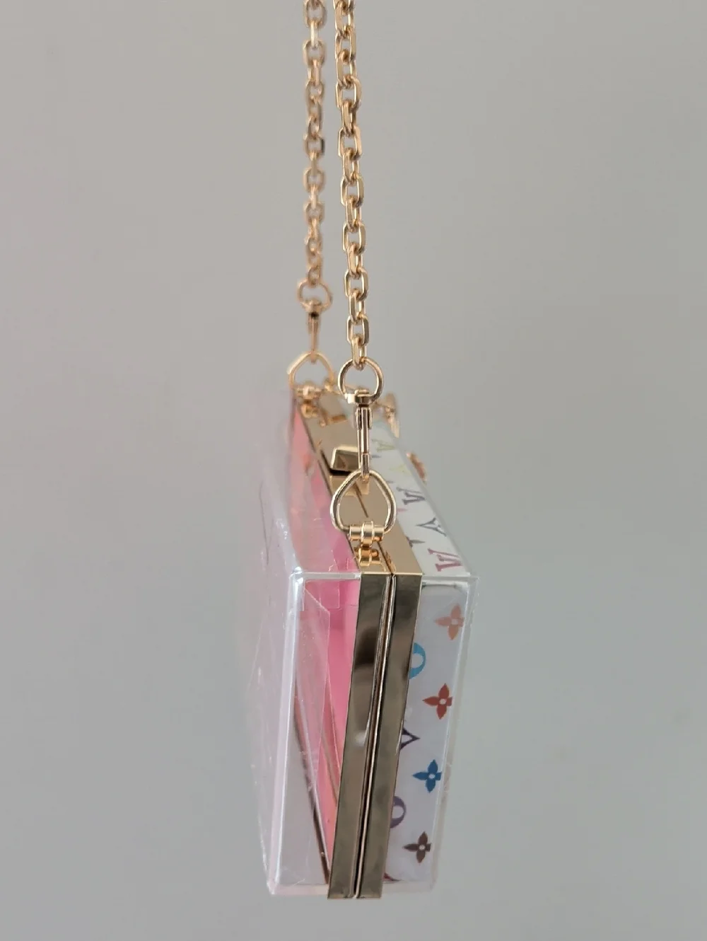 UPCYCLED Novelty Clutch with Pink Handle